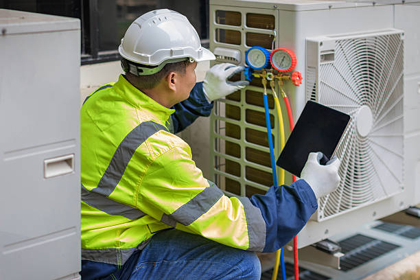 Professional Hvac technician working in Wheatland, WY